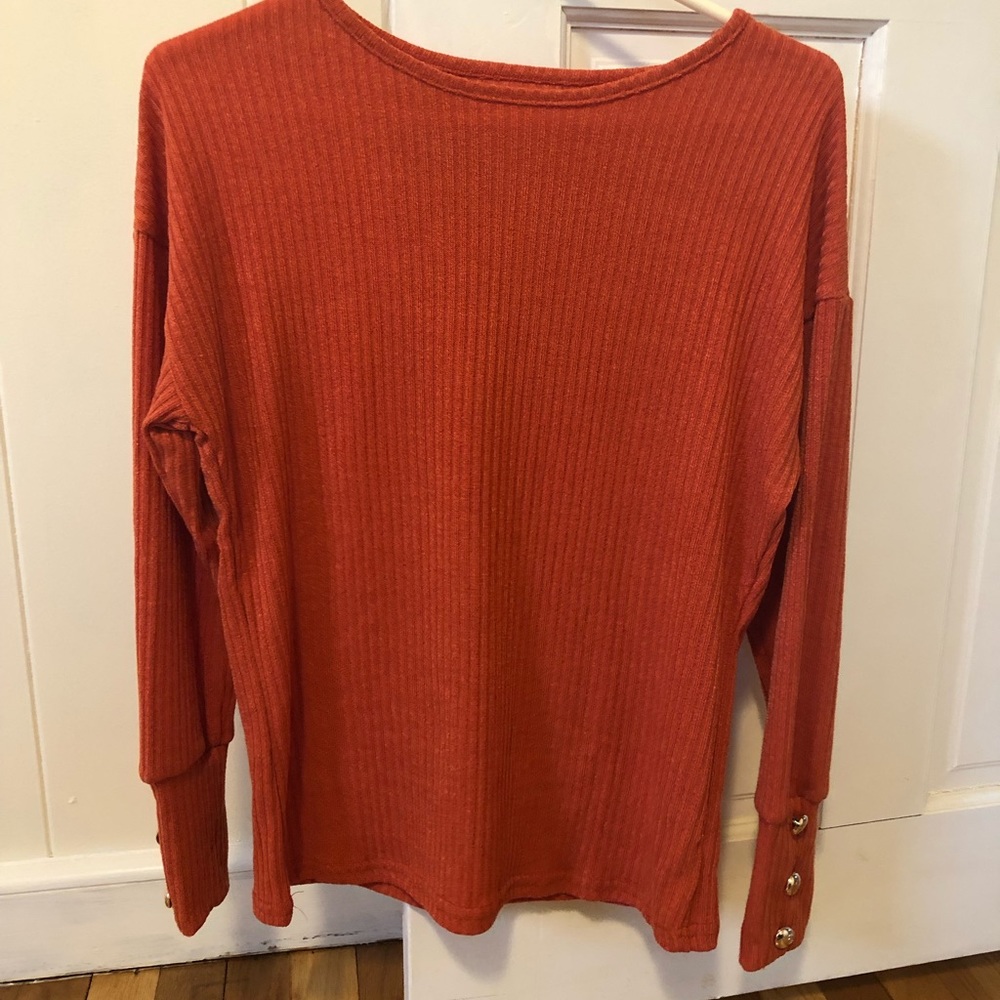 Coral sweater with gold accents!